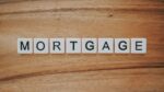 Mortgage approval process Ireland documents and house keys on a desk with pen